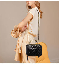 lady wearing black leather camera bag for ladies