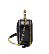 side view of black leather camera bag for ladies